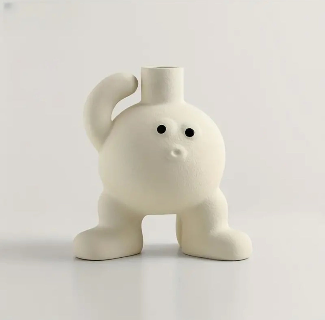 White ceramic vase with big feet design for home decor