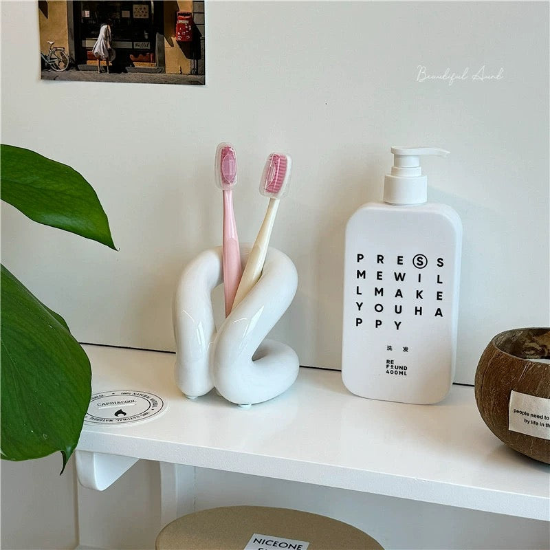 Space-saving ceramic holder for toothbrushes, paintbrushes, and utensils