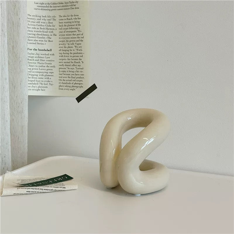 Ceramic holder for toothbrush and paintbrush with simple, sleek design