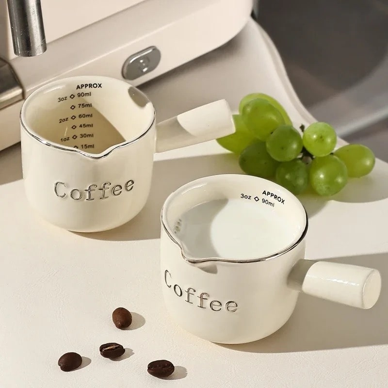 Handmade ceramic measuring cup with scale for espresso