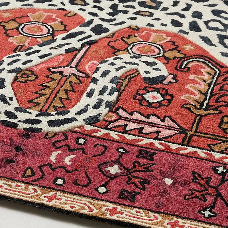Washable soft polyester rug with leopard motif and boho accents