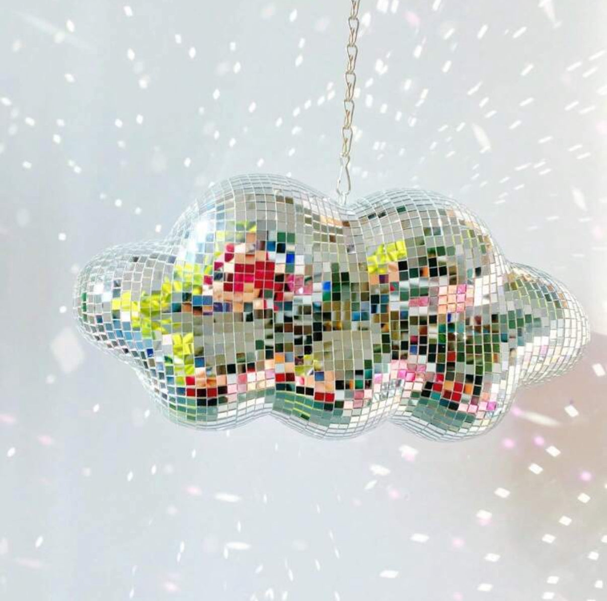 Rose gold disco ball in cloud shape for aesthetic party vibes.
