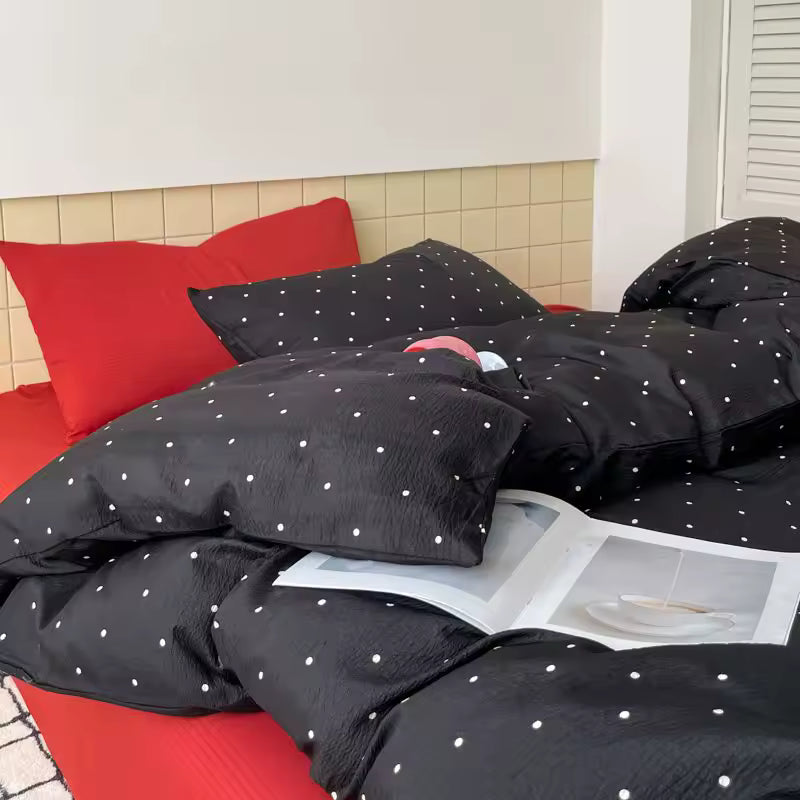 Preppy polka dot bedding set paired with neutral walls for balanced room look modern decor