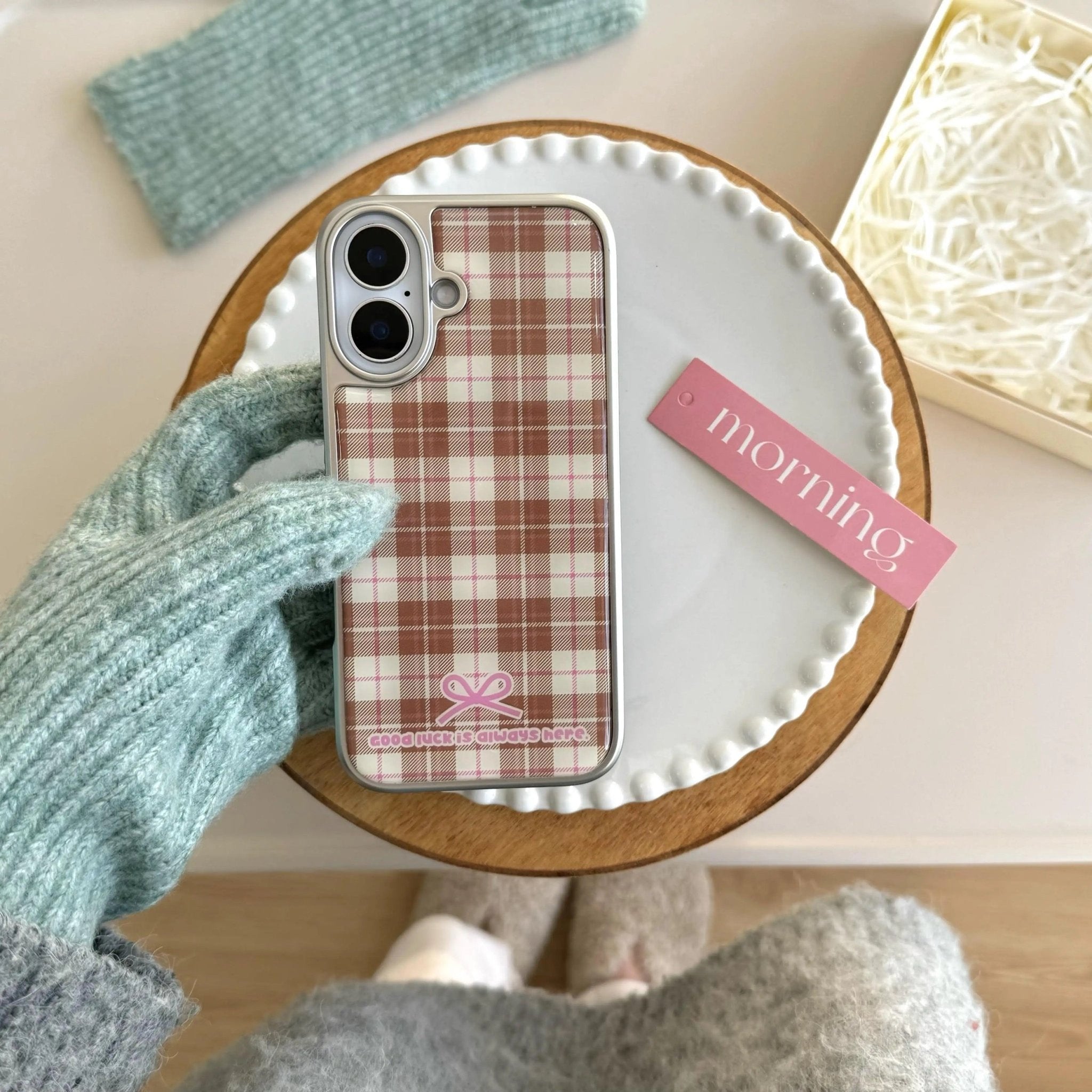 Glossy iPhone case in pink and cream tones for soft girl fashion and tech lovers