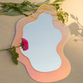 Abstract wavy mirror with colorful iridescent finish