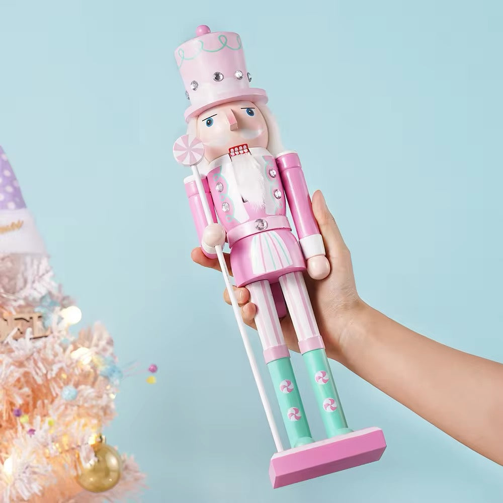 Hand-painted wooden nutcracker soldier for Christmas decor. Colorful and festive ornament perfect for tree or home decorations.