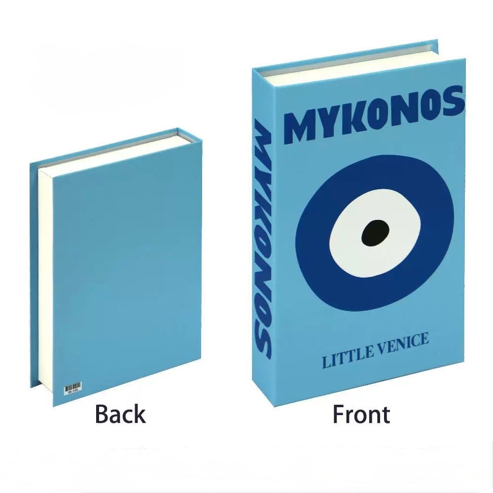 Close-up of pink and yellow faux books with playful cover art, ideal for soft girl dorm decor.