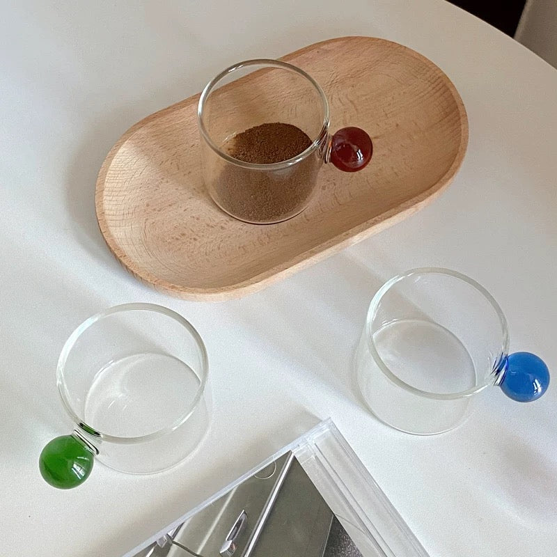 Colorful ceramic mugs for aesthetic kitchen decor, ideal for coffee lovers