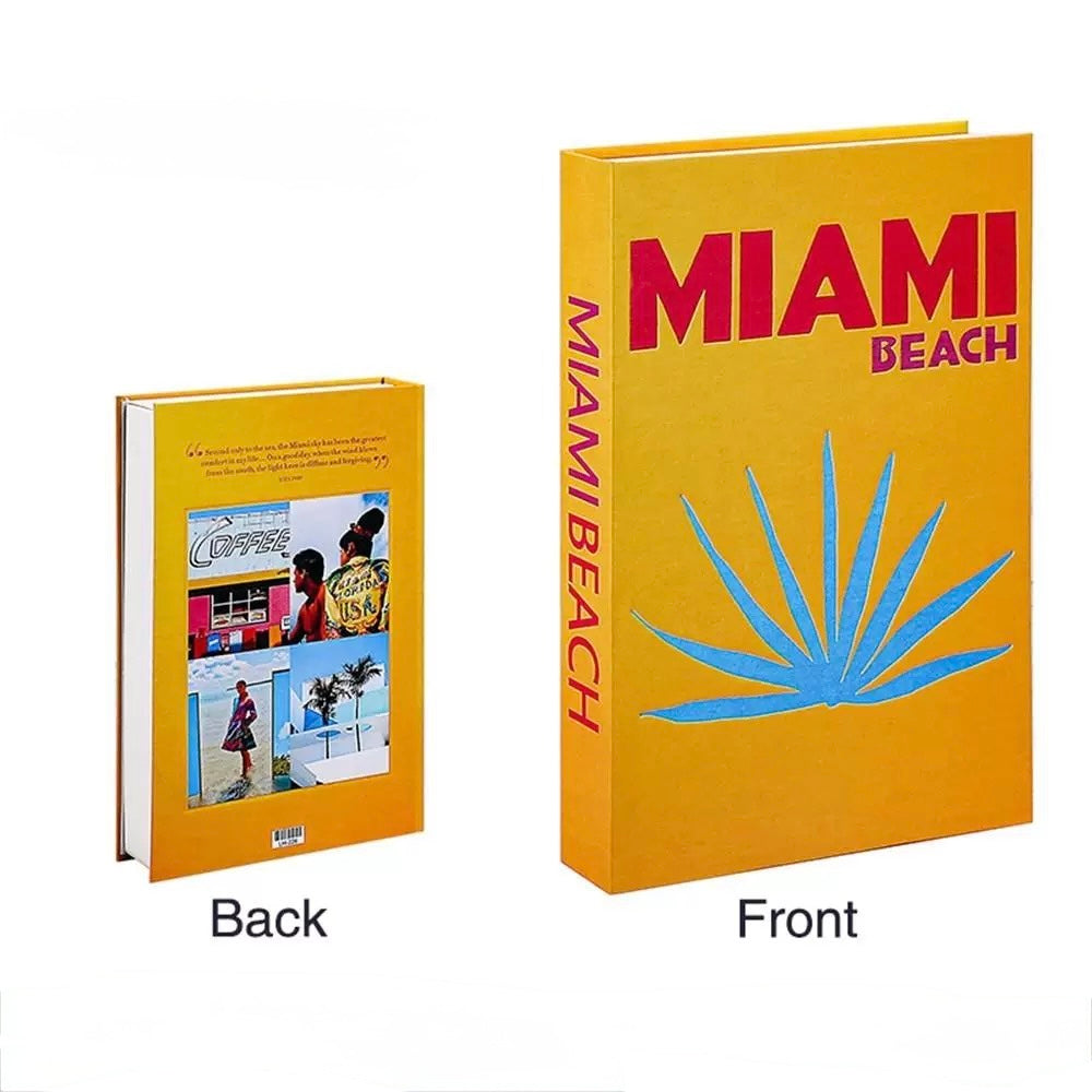 Close-up of the word "IBIZA" in bold yellow on a pink decorative book box with a red flower print.