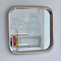 Vintage silvery rectangular mirror with Nordic design. Ideal for creating an aesthetic bathroom or bedroom decor.