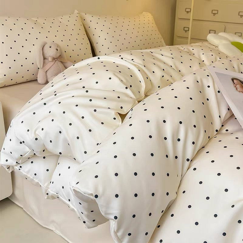 Minimalist black polka dot duvet cover set for college dorm rooms.