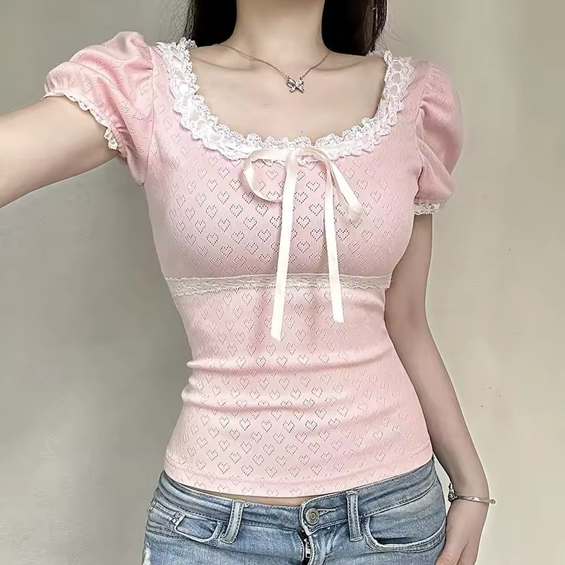 Feminine aesthetic top with pink lace trim and puffed sleeves