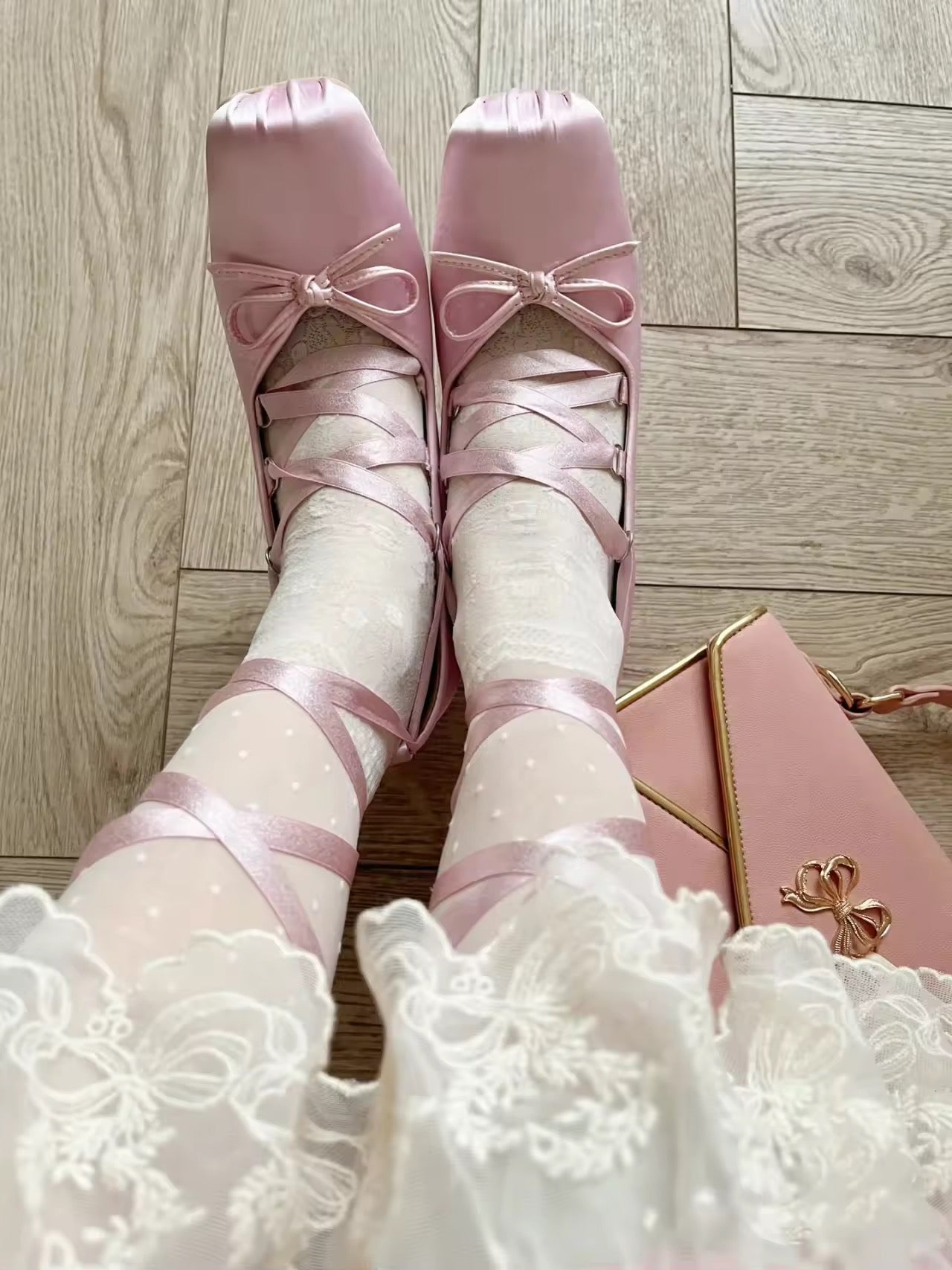 High heels Lolita pumps in pink with a platform and lace-up design