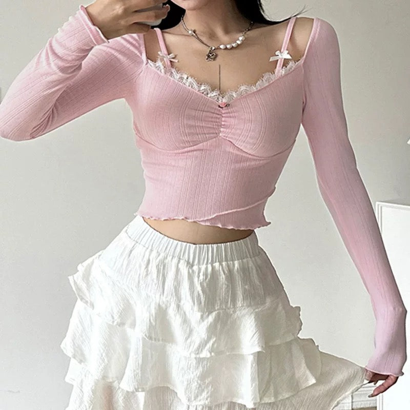 Soft girl pink top with delicate bow accents