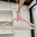 Wedding gown hanger with premium pearl design