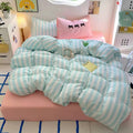 Coquette aesthetic pastel stripe bedding set with pink bow pillowcases in a cozy bedroom decor.