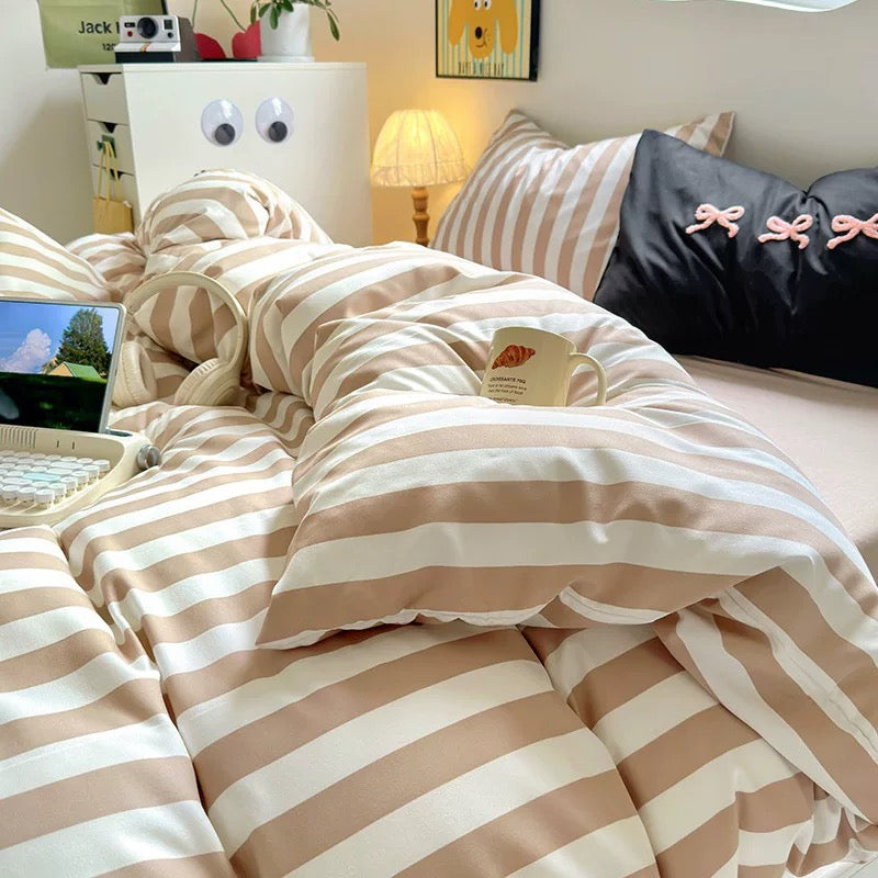 Korean coquette bedding set in cream and beige stripes.