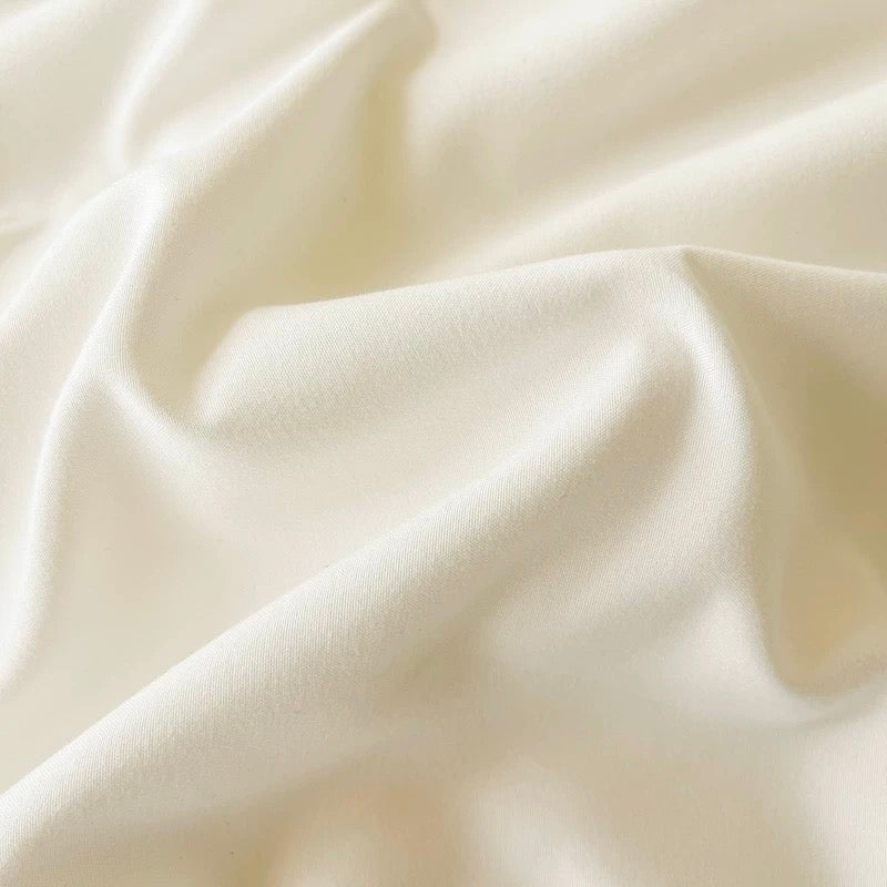 Close-up of beige fabric with soft folds