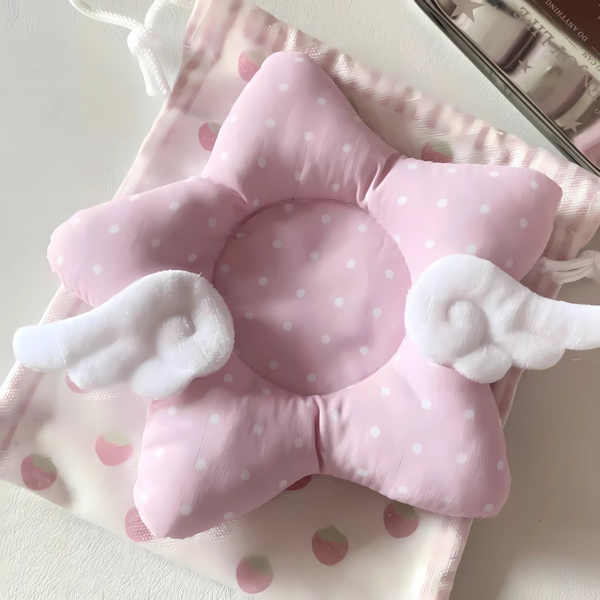 Star-shaped pink kawaii coaster displayed with pastel pink accessories.