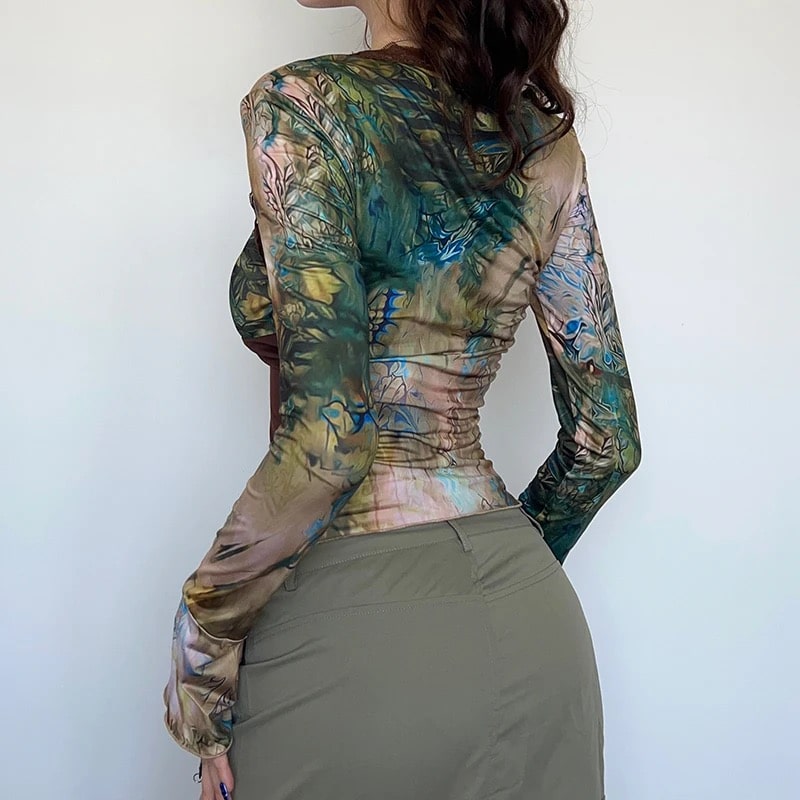 Chic vintage crop top with printed patchwork design. Long sleeve Y2K top for casual or cottagecore style looks.