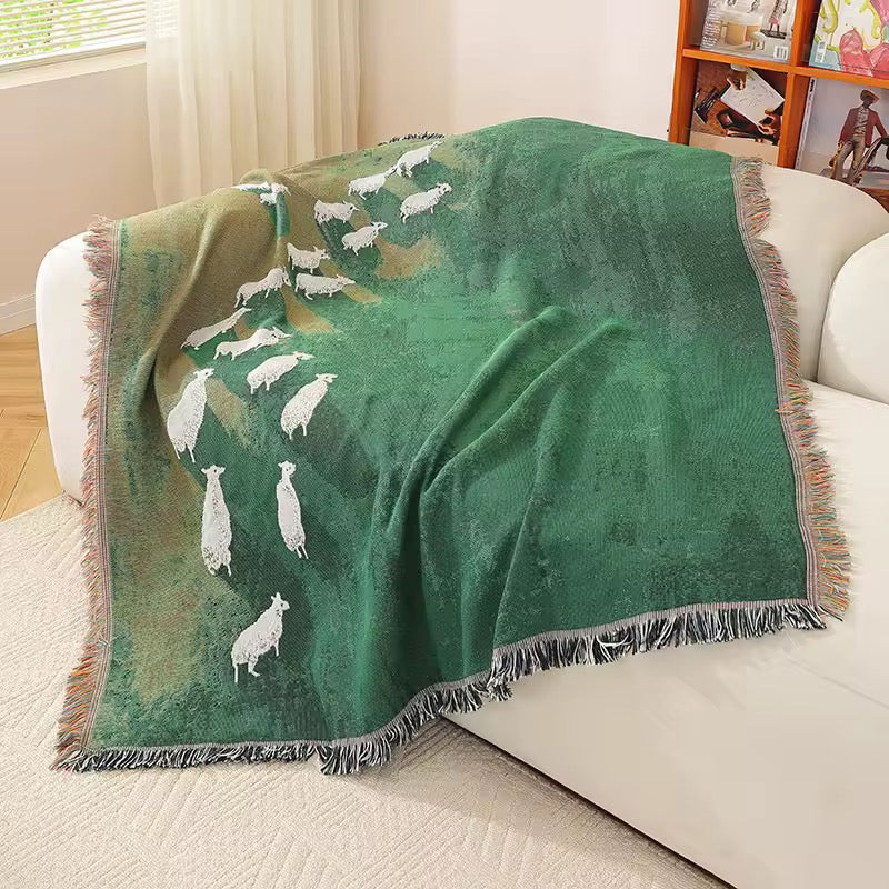 Fringed edges of rustic cotton throw blanket adding farmhouse chic detail.