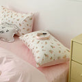 Cozy cotton dorm bedding with pink bow accents