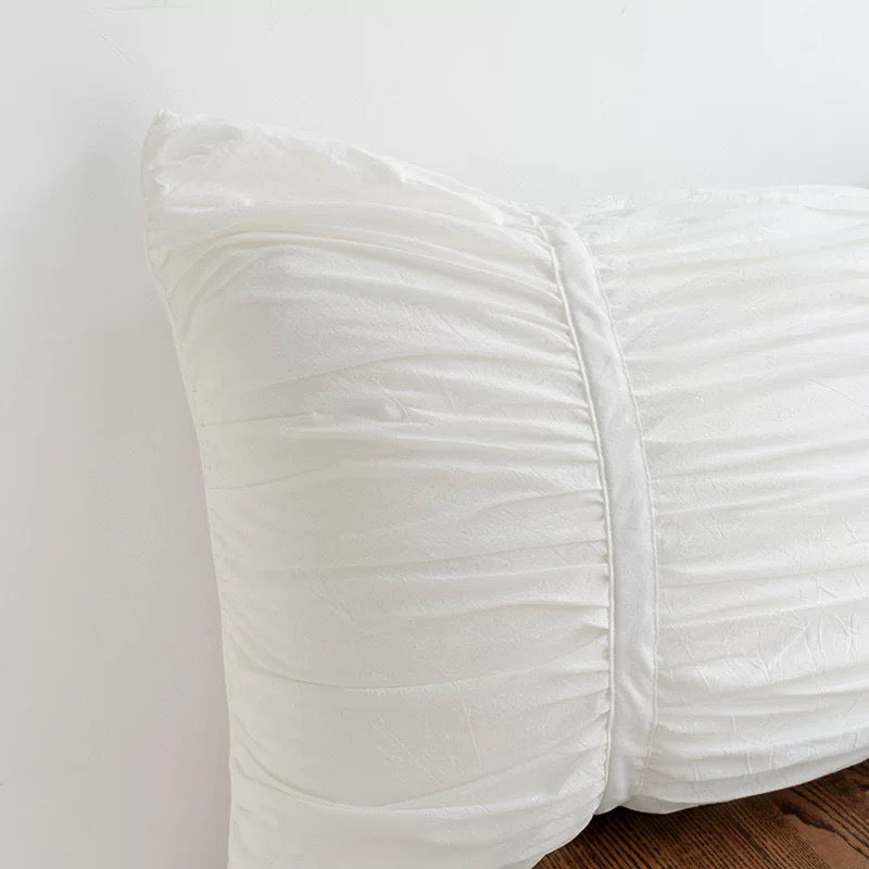 White pleated pillowcase with ruched texture, ideal for minimalist or Korean-inspired bedrooms.