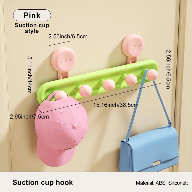 Suction cup hook with pink and green design, showing dimensions and material details.