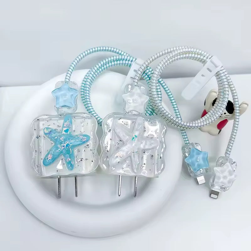 Star-shaped phone chargers with blue accents on a white background