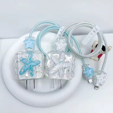 Star-shaped phone chargers with blue accents on a white background