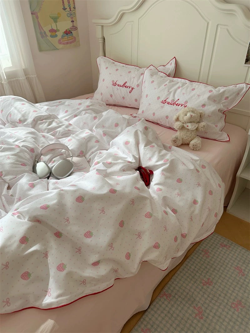 Children's bedroom with pink and white bedding featuring teddy bears and 'Babycare' branding.