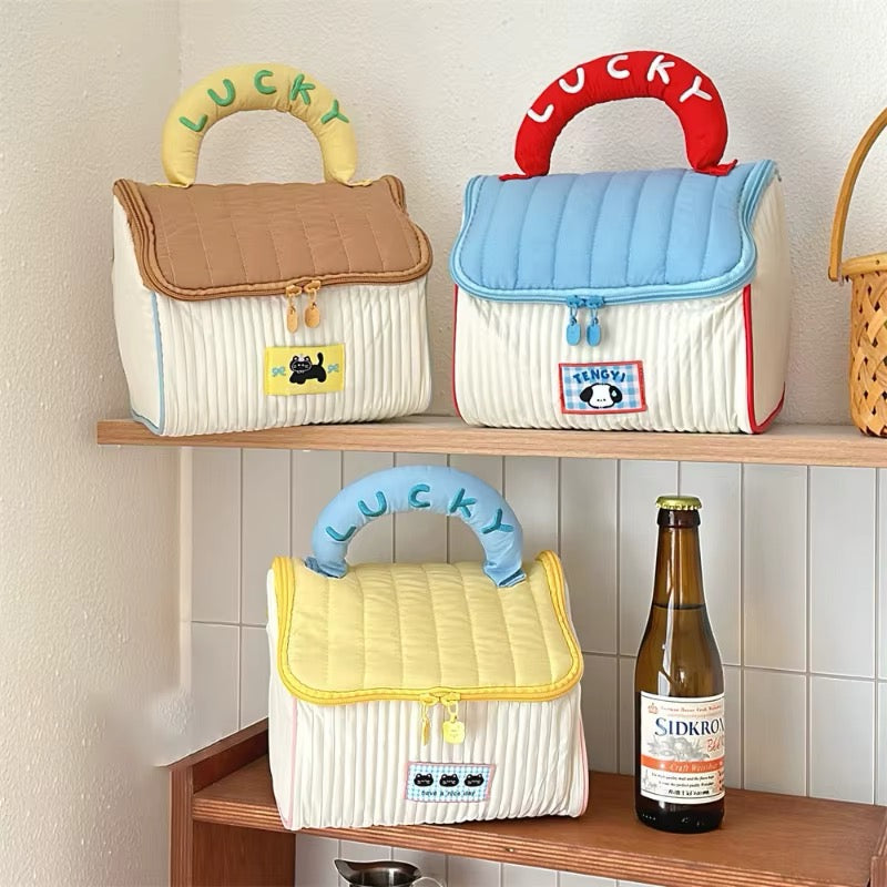 Adorable house-shaped makeup bag in kawaii cottagecore style with zipper and soft handle, ideal for skincare and toiletries