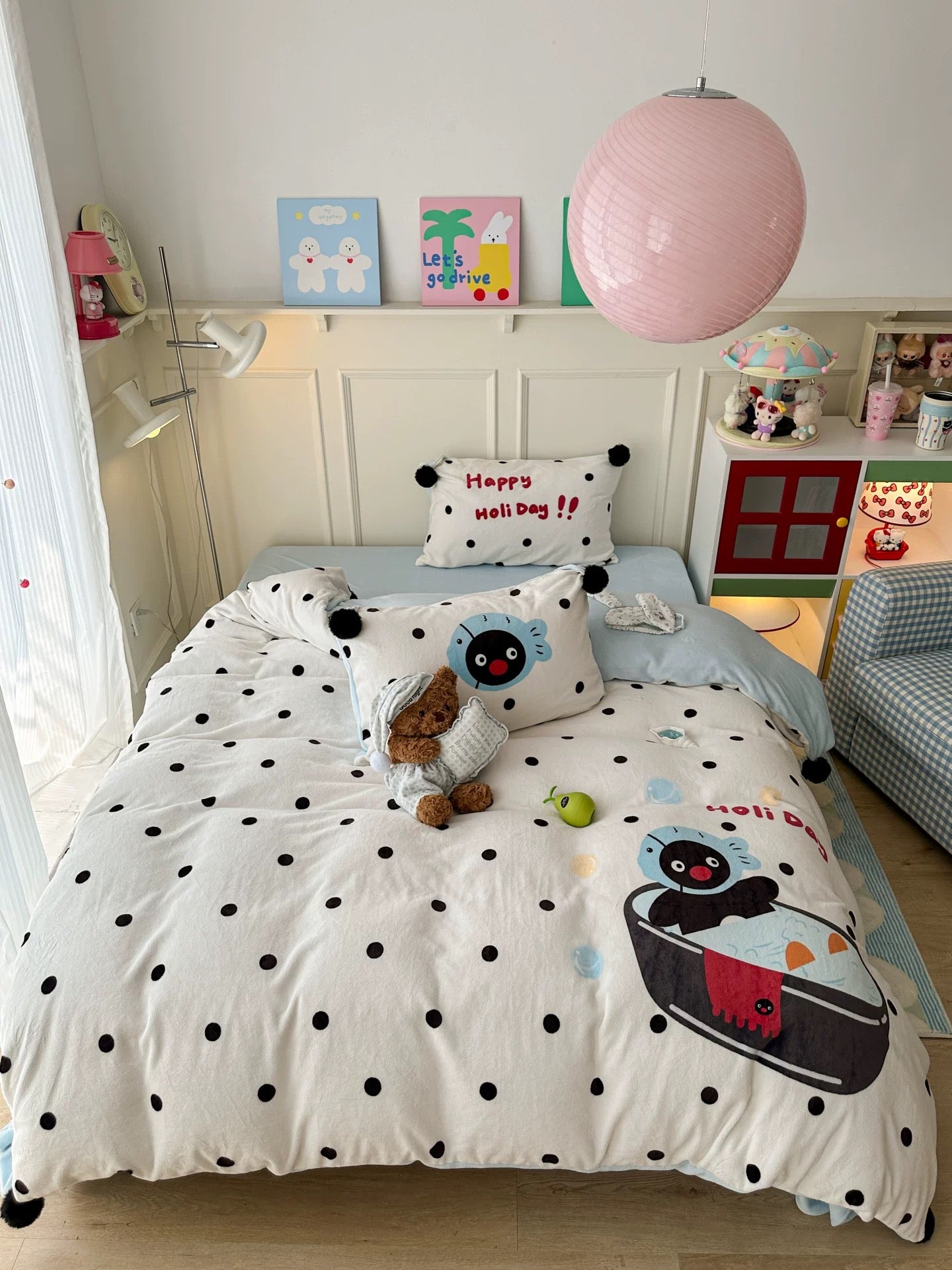 Cute penguin fleece bedding styled on bed with plush texture in cozy bedroom