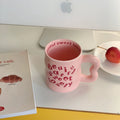 Cute ceramic mug in pink for aesthetic room decor