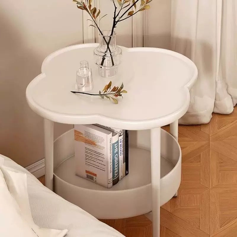 Coffee table in clover shape with functional bottom shelf and aesthetic top