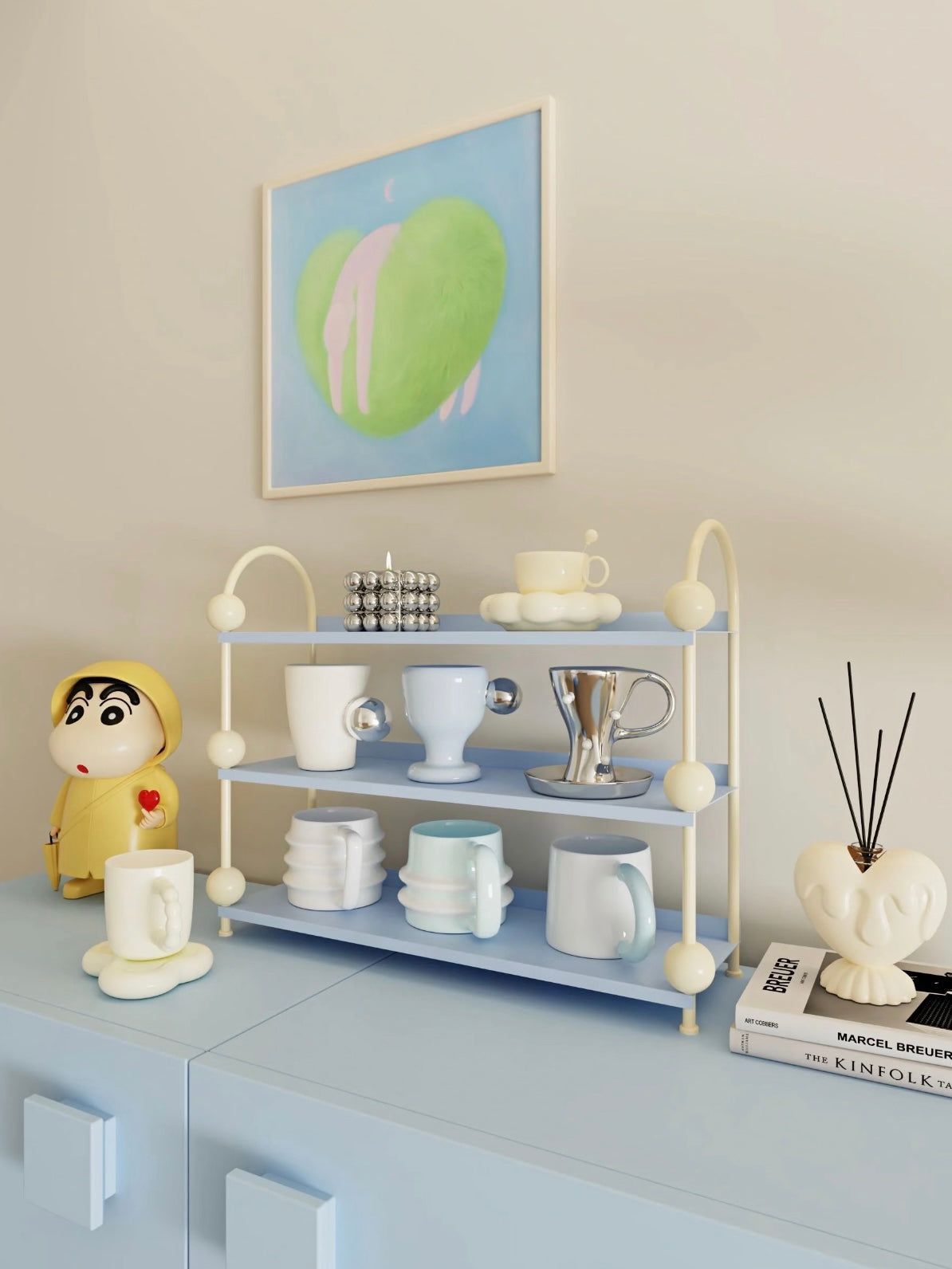 Blue shelves and cream arches bring Danish pastel decor to an angled view of the open tabletop rack.