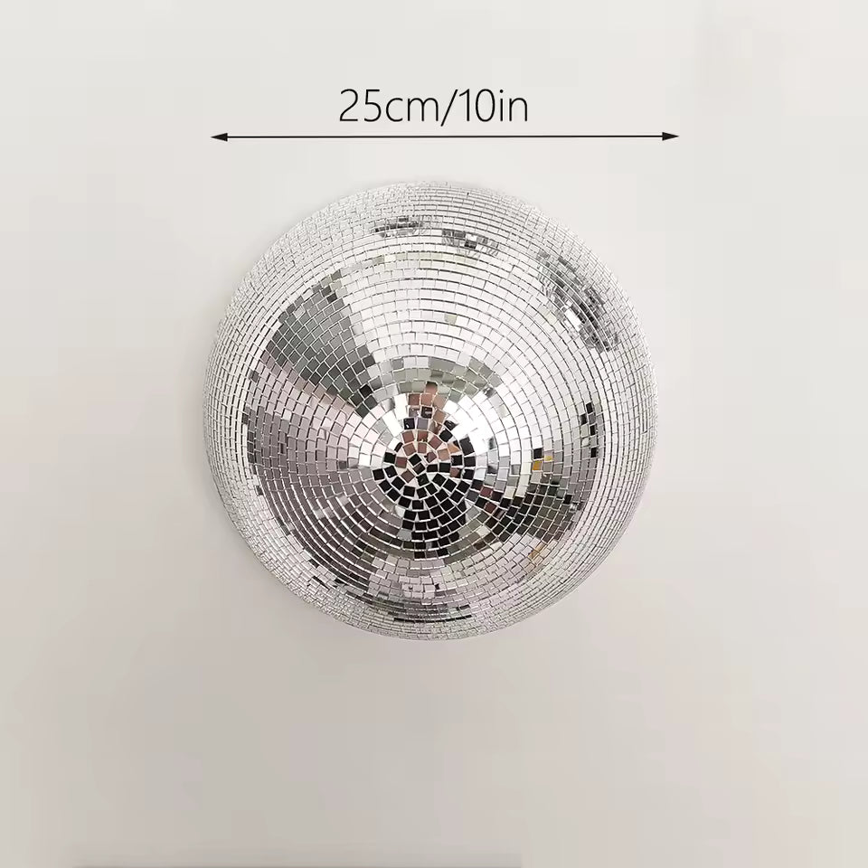Silver disco ball with dimensions labeled on a white background