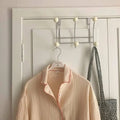 Retro wall-mounted coat rack for entryways, offering multi-functional storage