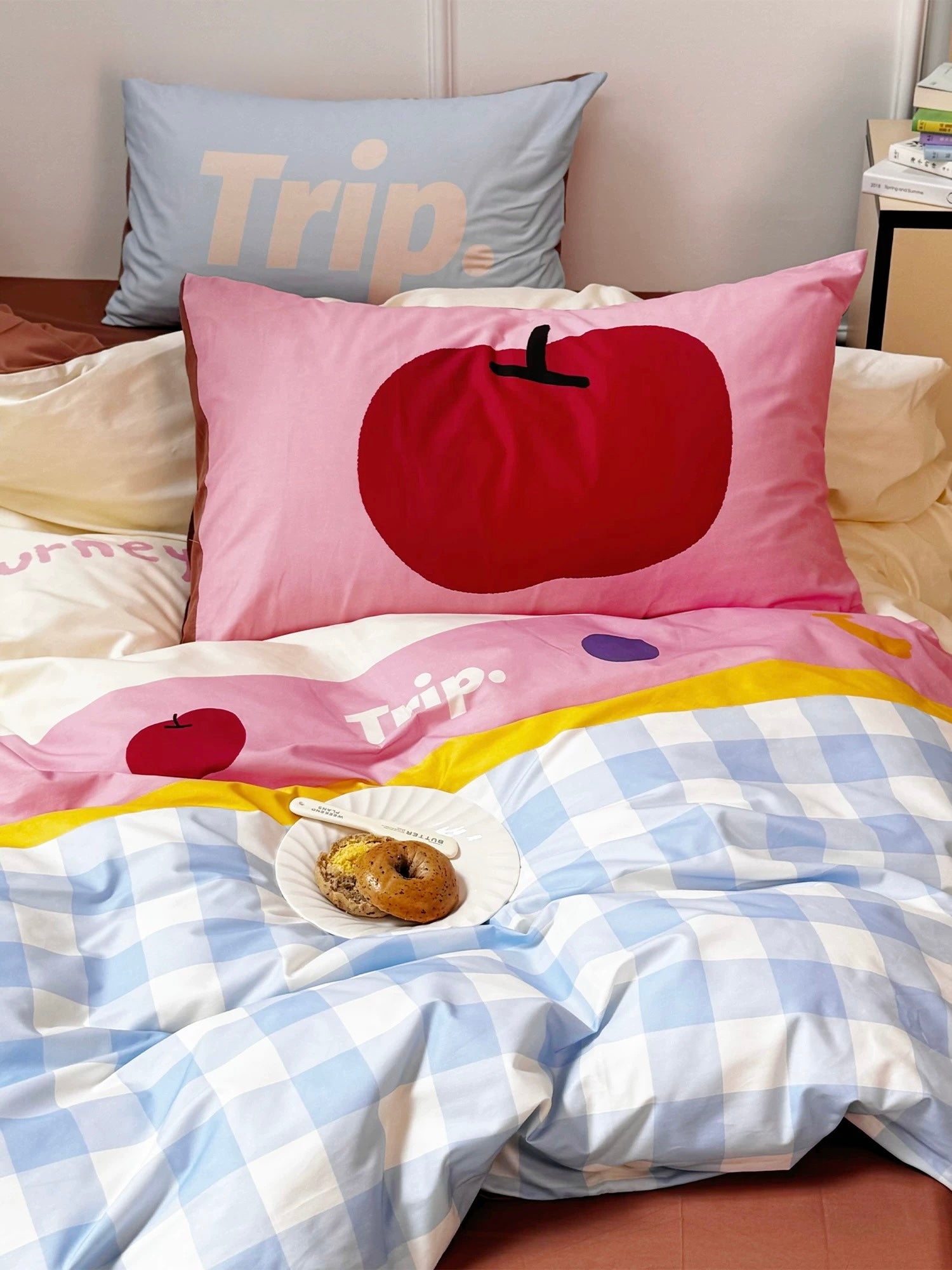 Dopamine pastel cotton bedding set with gingham duvet cover styled in a Canadian dorm room.