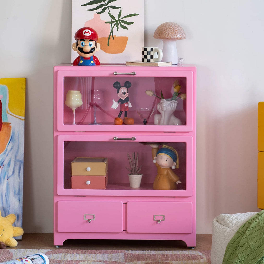 Pink dopamine display cabinet used as playful storage sideboard in pastel aesthetic interior room design