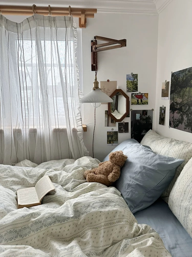 French country inspired cotton bedding with botanical floral print adding timeless elegance to relaxing bedroom decor daily.