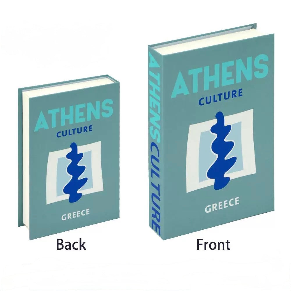 Close-up of faux books used as styling props for fashion or interior shoots.