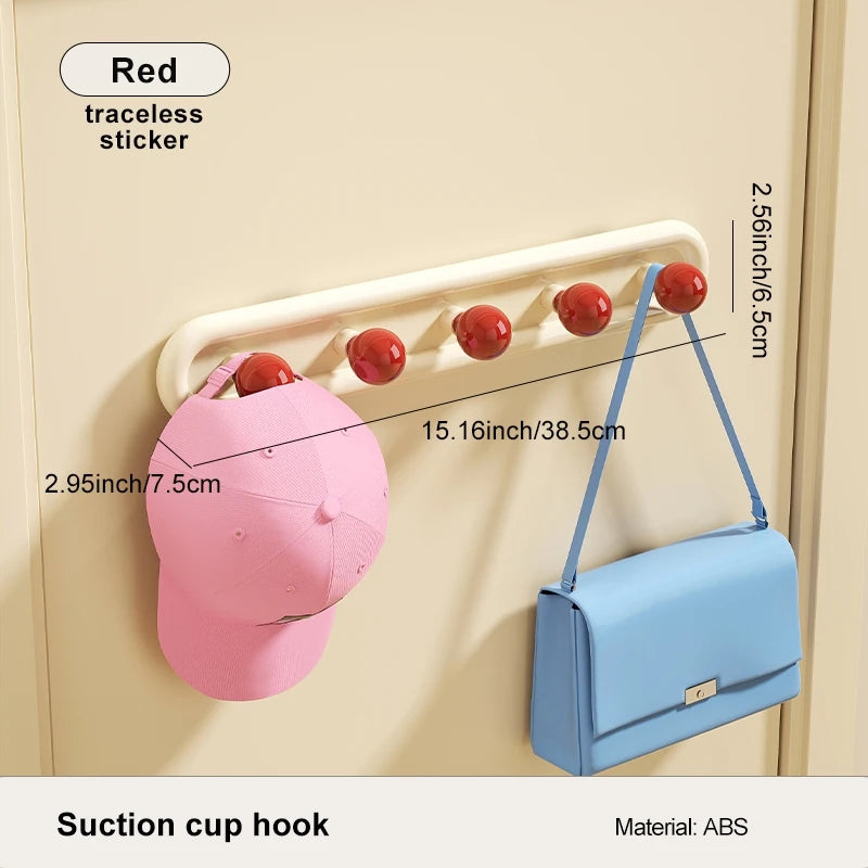 Five hook wall rack in blue and yellow shown with dimensions and suction cup mounts.
