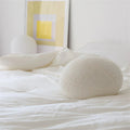 Teddy ball cushion in soft white boucle for scandinavian interiors