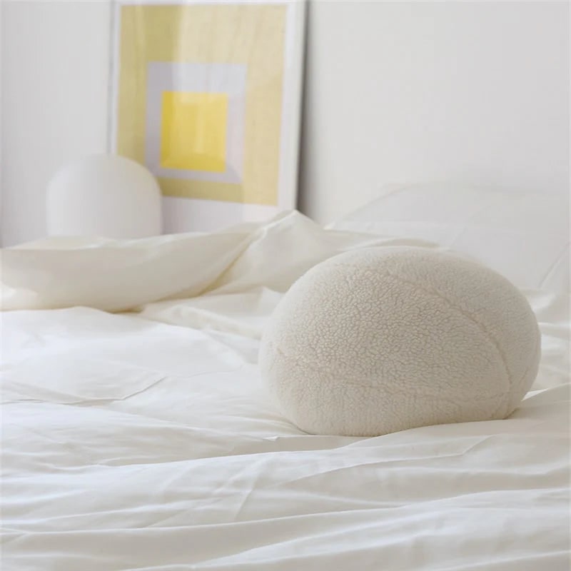 Teddy ball cushion in soft white boucle for scandinavian interiors