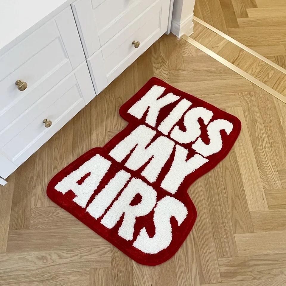 Red modern Kiss My Airs rug – aesthetic room decor