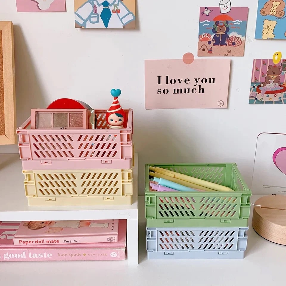 Foldable plastic storage baskets in pastel colors