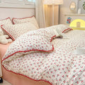 Red cherry floral bedding set in a stylish room