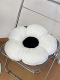 Black and white plush daisy pillow, ideal for room decor