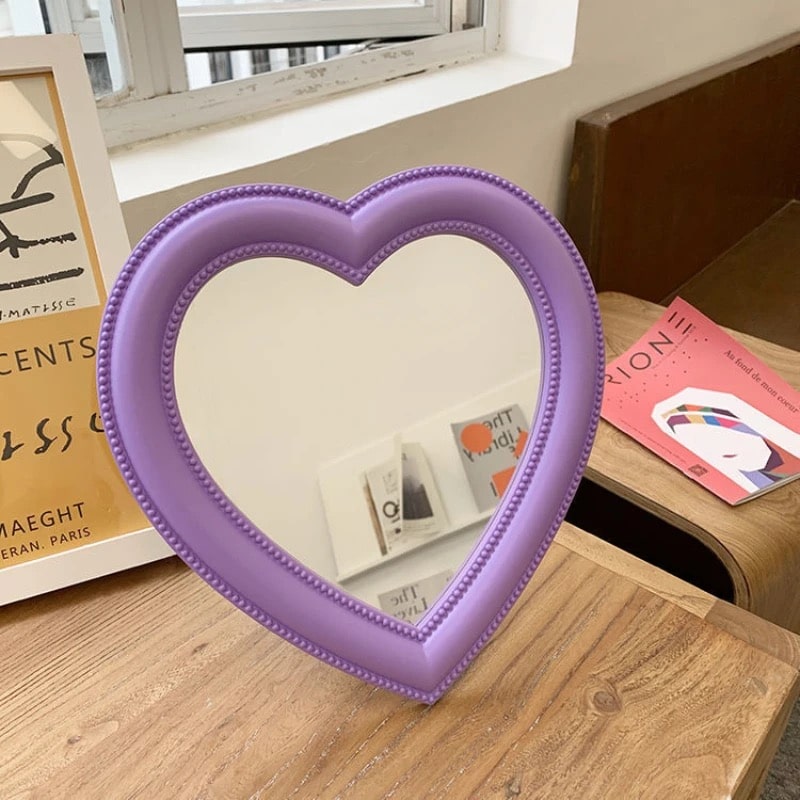 Decorative heart-shaped mirror for vanity and wall use